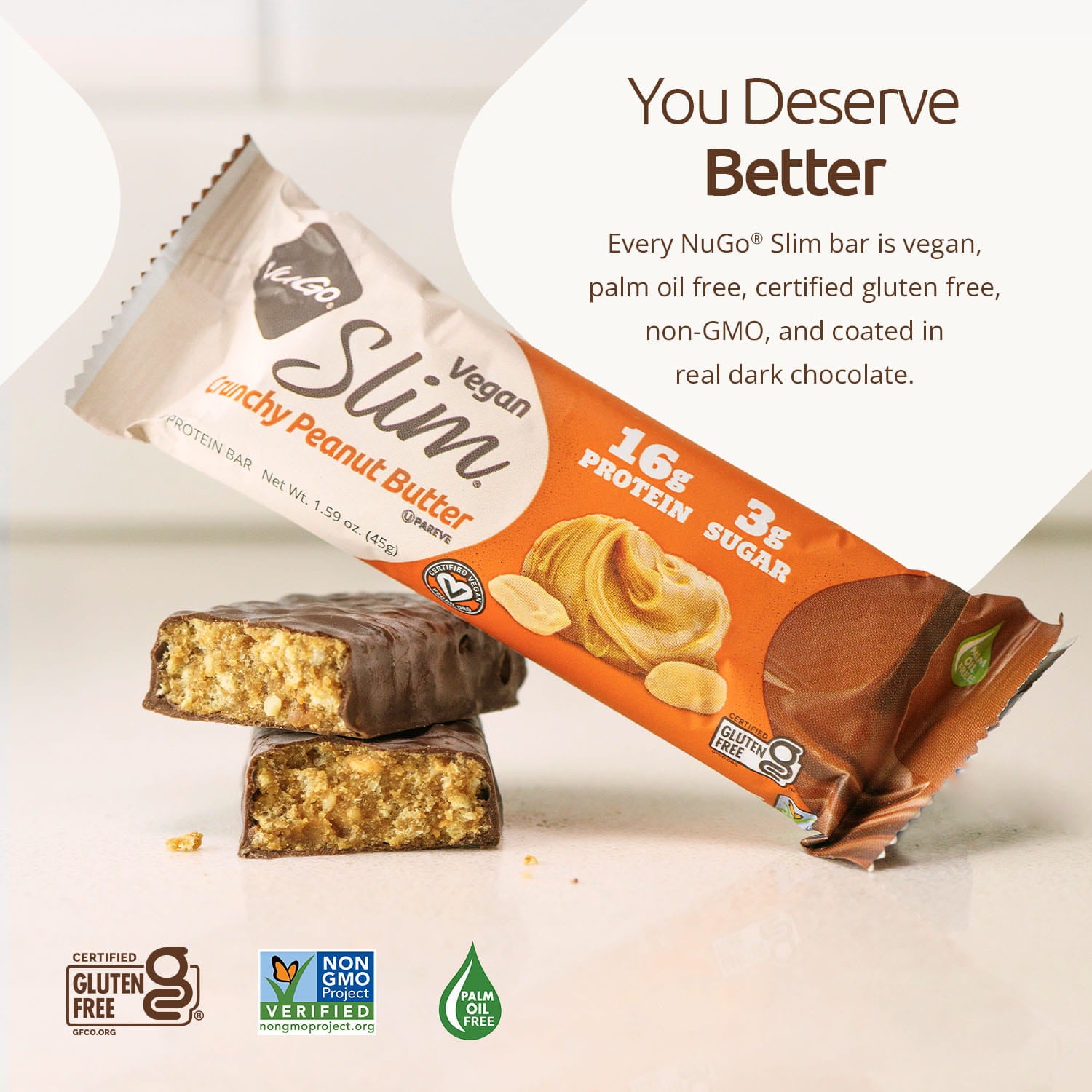 NuGo Vegan Slim Peanut Butter protein bar with packaging on a light background