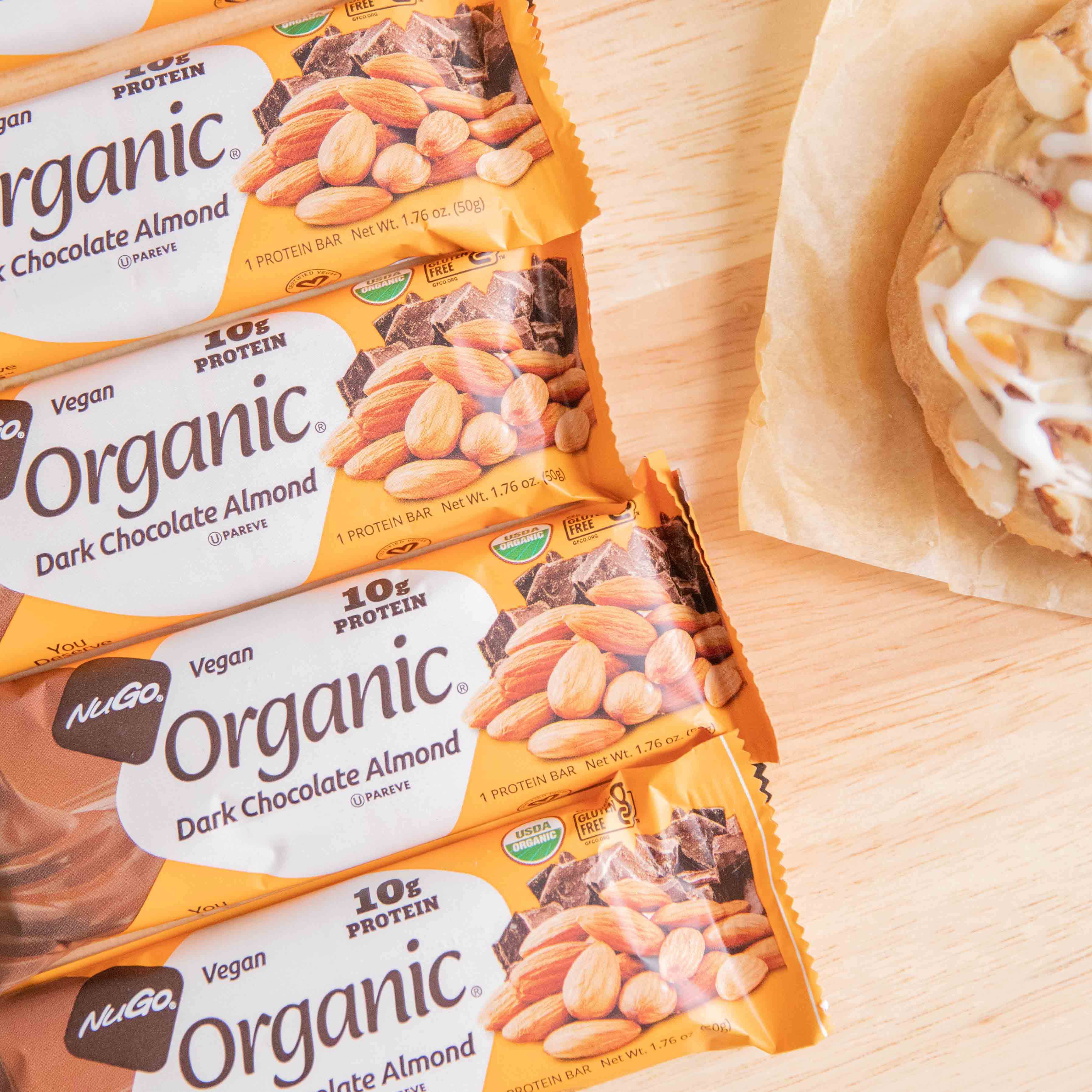 4 Organic Almond Bars on Wooden Table
