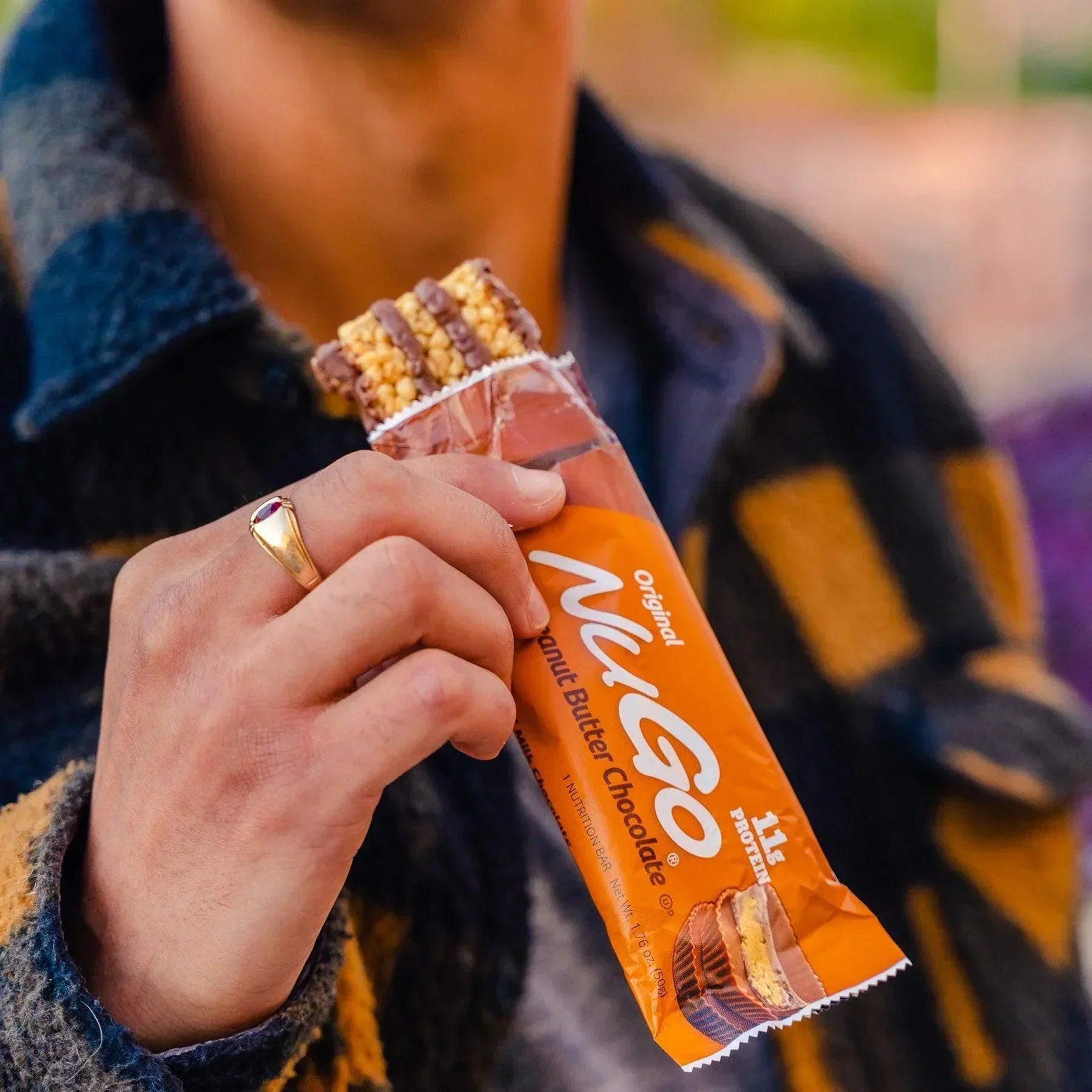 Man eating Peanut Butter Chocolate Bar