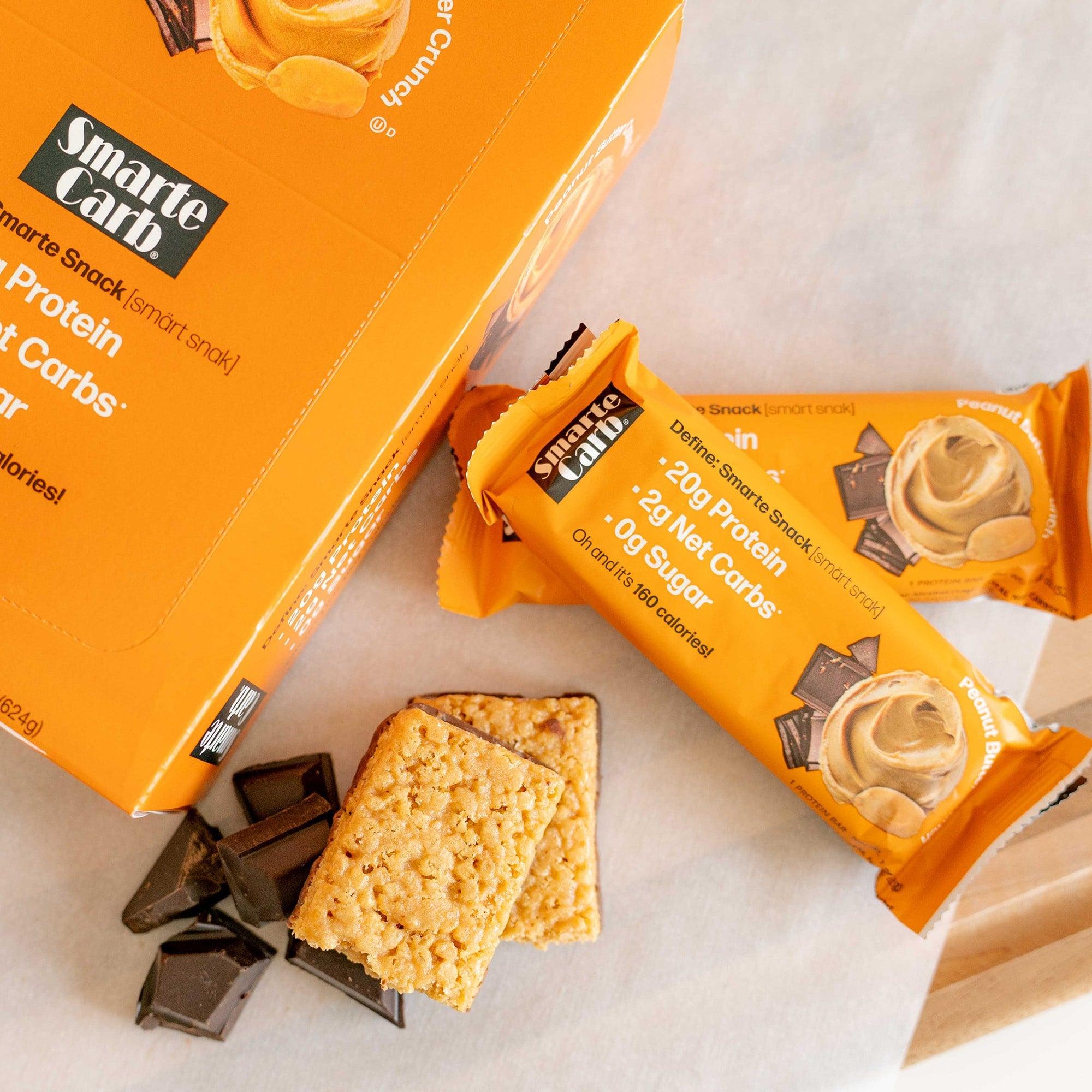 Open Peanut Butter Smarte Carb Bar next to Tray