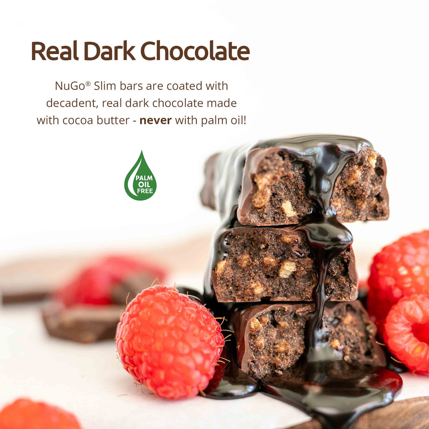 NuGo Slim bars coated with real dark chocolate and raspberries on a white background