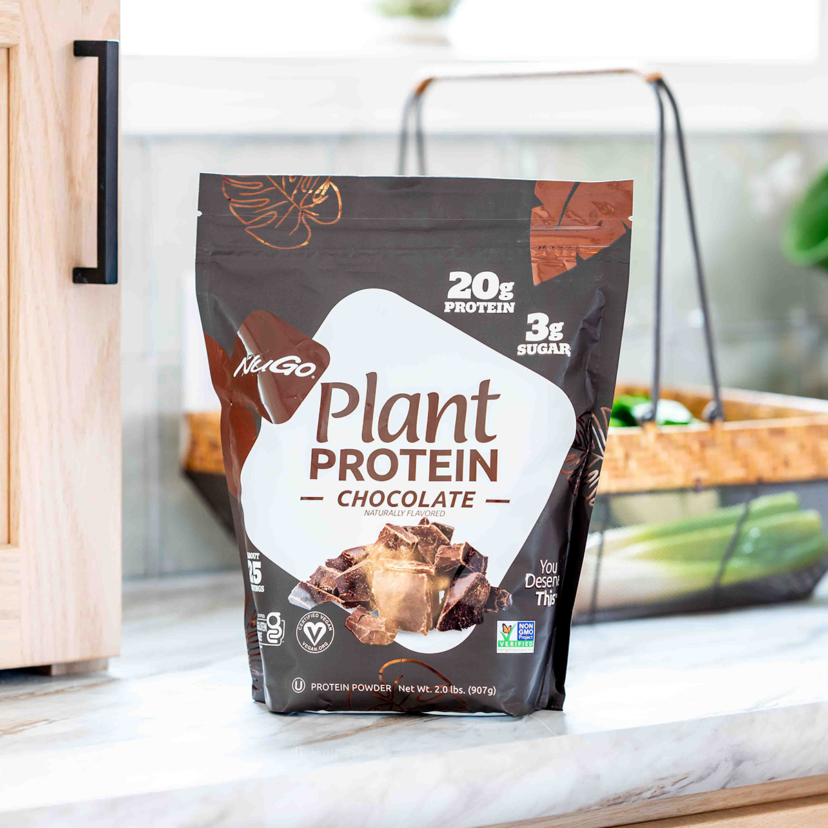 NuGo Plant Protein Chocolate package on a kitchen counter